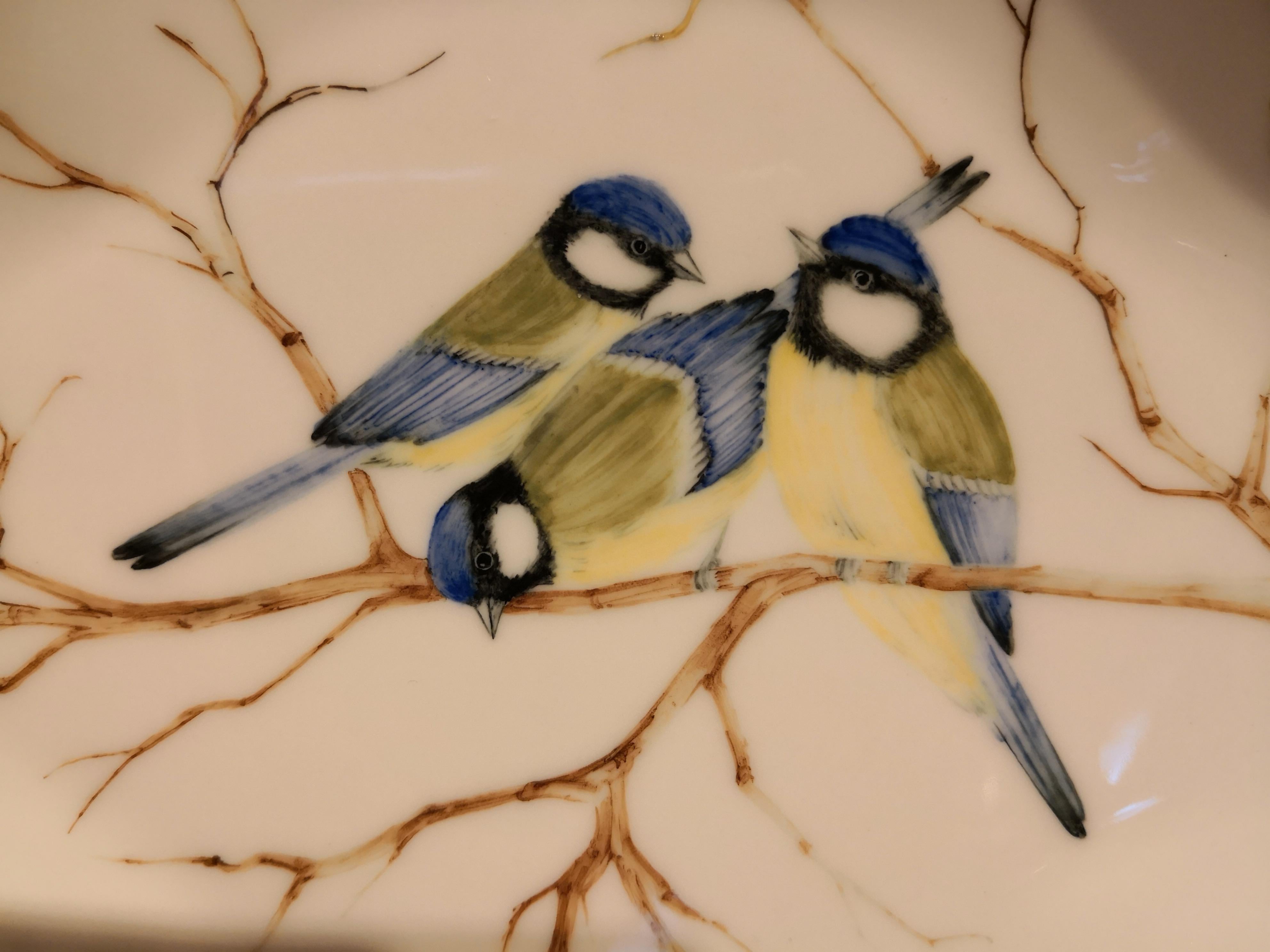 Large completely handmade porcelain dish is hands-free painted with a naturalistic decor of three great tits sitting on leaves. Green rimmed with a fine 24-carat gold line.
Handmade in Bavaria/Germany.
About Sofina porcelain:
Based on the