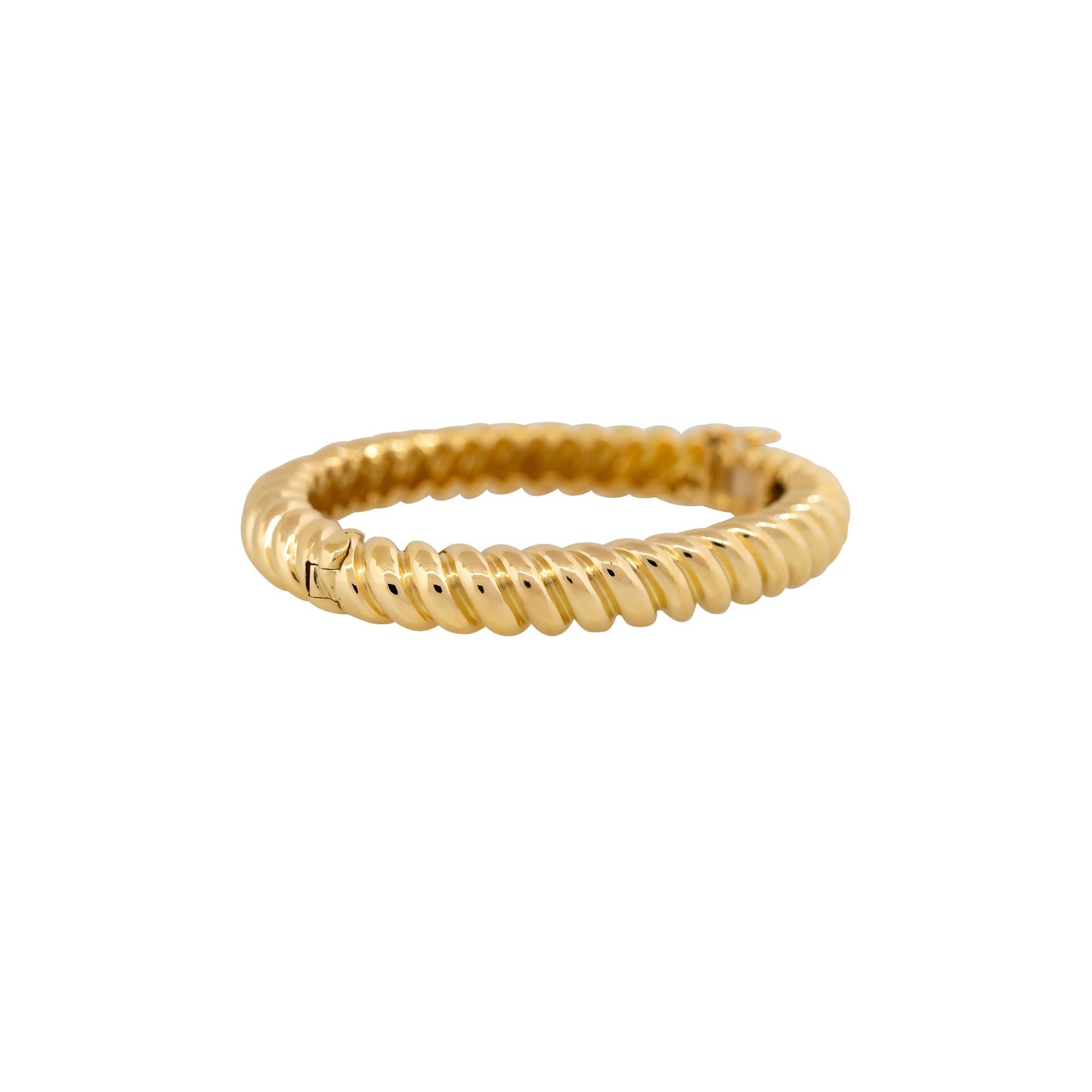 18k Yellow Gold Oval Shaped Ribbed Bangle Bracelet
Material: 18K Yellow Gold
Diamond Details: n/a
 Diamond Clarity: n/a
Diamond Color: n/a
Total Weight: 44.7g (28.9dwt)
Size: This bracelet is approximately 6.5 inches in length
Additional Details: