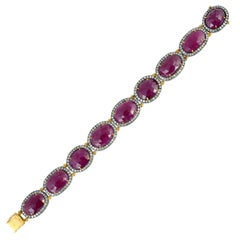 Oval Shaped Ruby Bracelet With Diamonds In 18k yellow gold & Silver