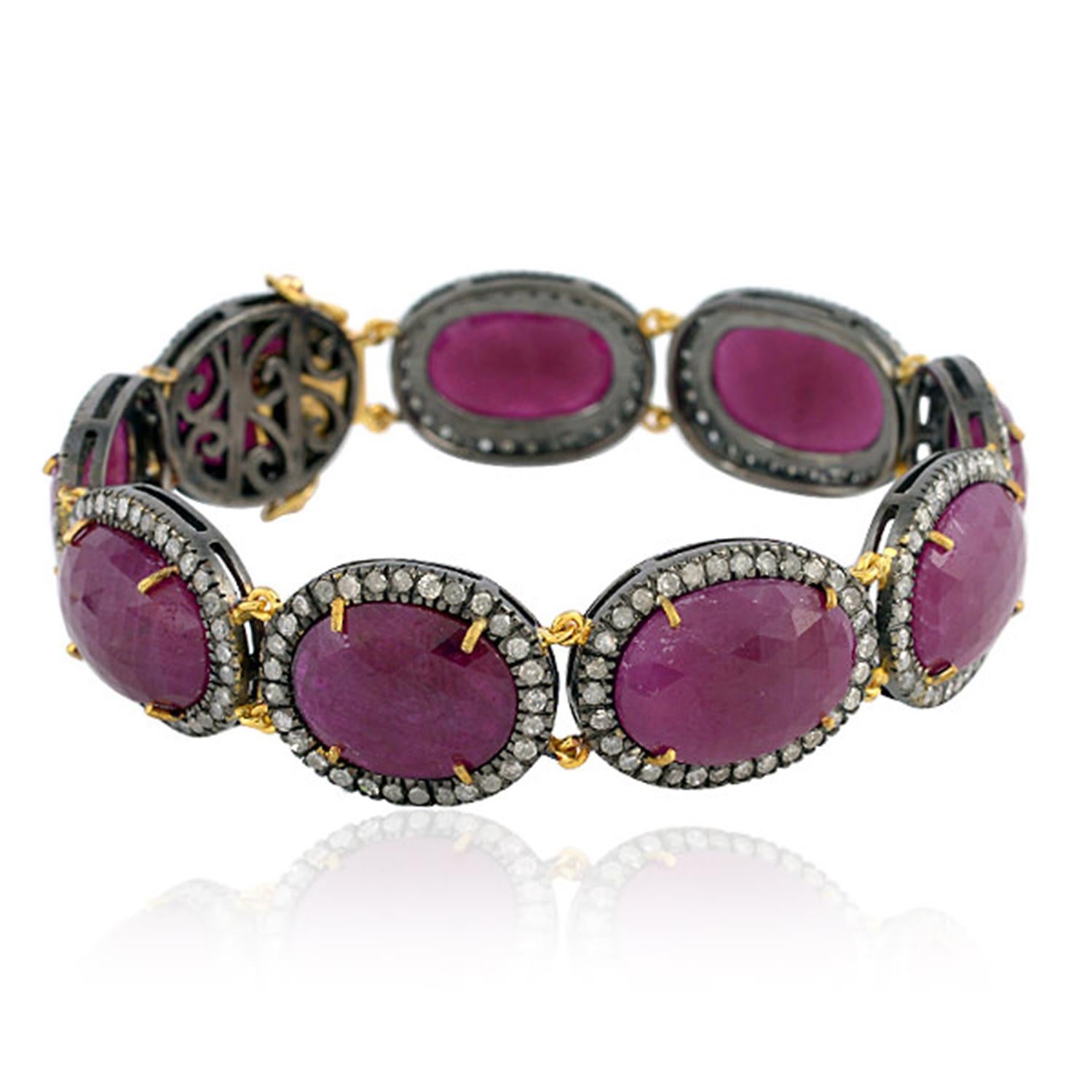 Art Déco Bracciale di rubini ovali con diamanti in oro giallo 18k e argento in vendita