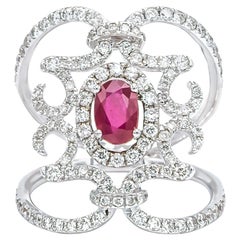 Oval Shaped Ruby Set in an Antique Style Curved Gold Band Cocktail Ring
