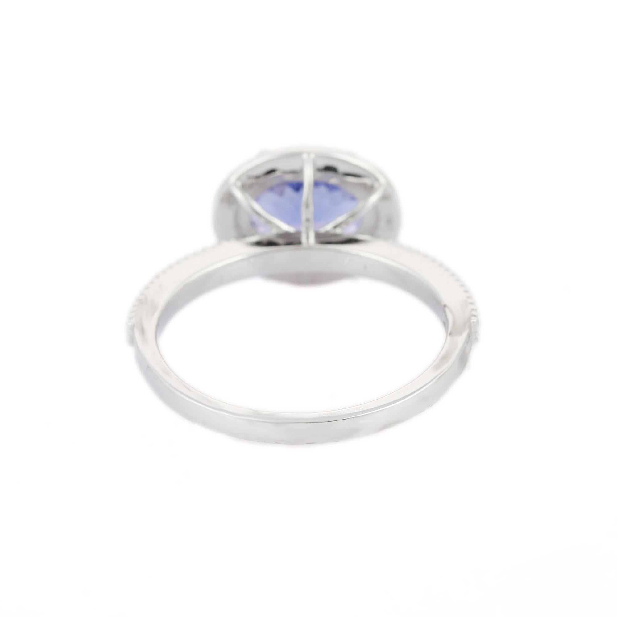 Im Angebot: Ovaler ovaler Tansanit- und Diamantring aus 18 Karat Weißgold () 4