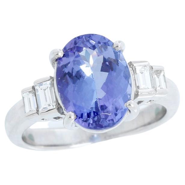 Bague en platine avec tanzanite de forme ovale et diamants, taille 7