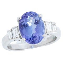 Bague en platine avec tanzanite de forme ovale et diamants, taille 7