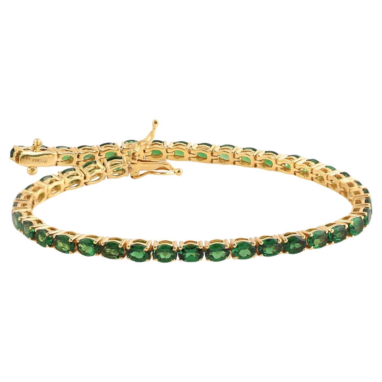 Oval geformtes Tsavorit-Tennisarmband aus 18 Karat Gelbgold