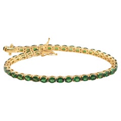 Oval Shaped Tsavorite Tennis Bracelet Made In 18K Yellow Gold