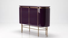 Meuble ovale à deux portes, en laque « Aubergine Noir » et métal patiné bronze