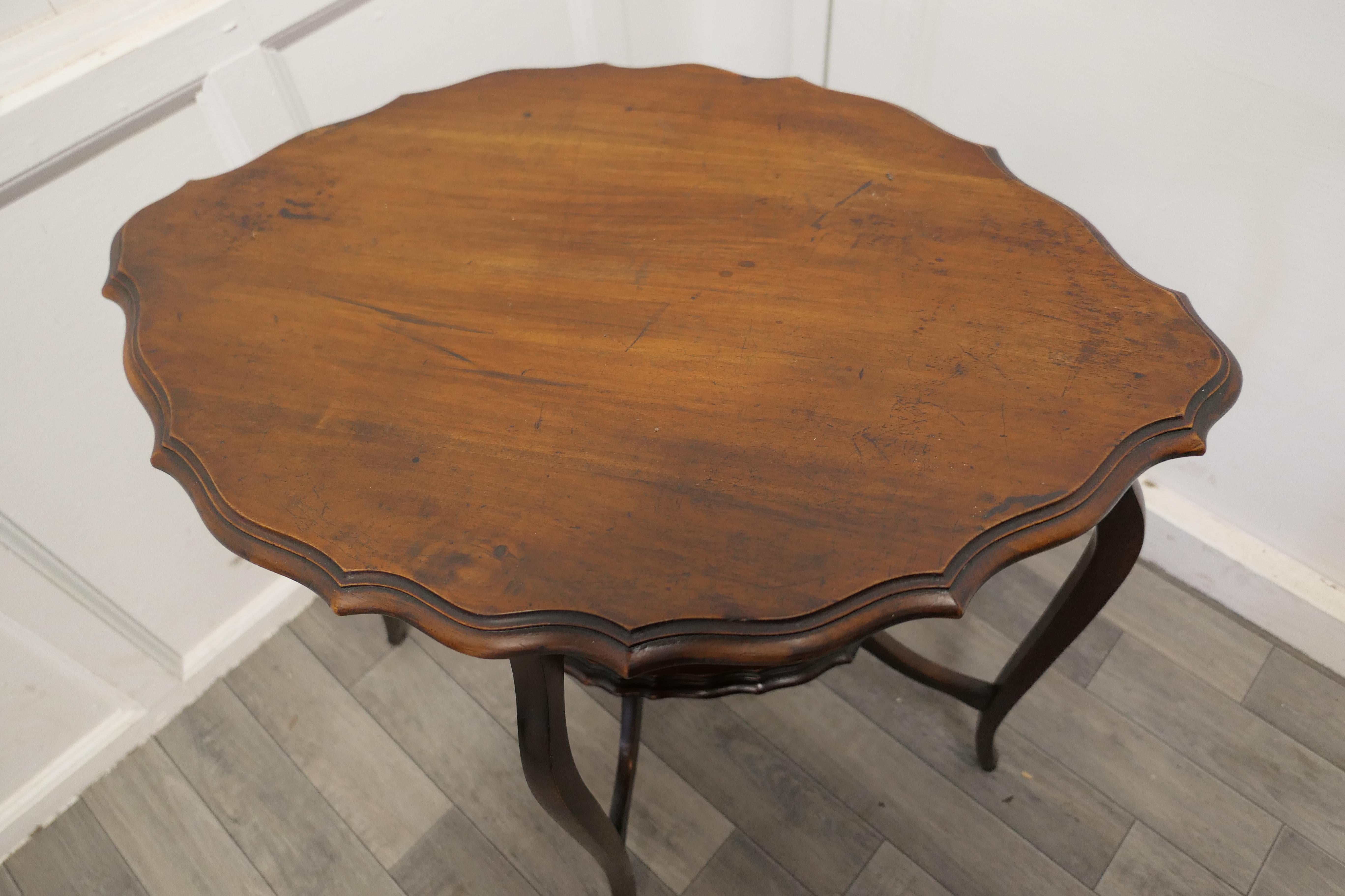 Edwardian Oval Shaped Walnut Occasional Table, with Undertier For Sale