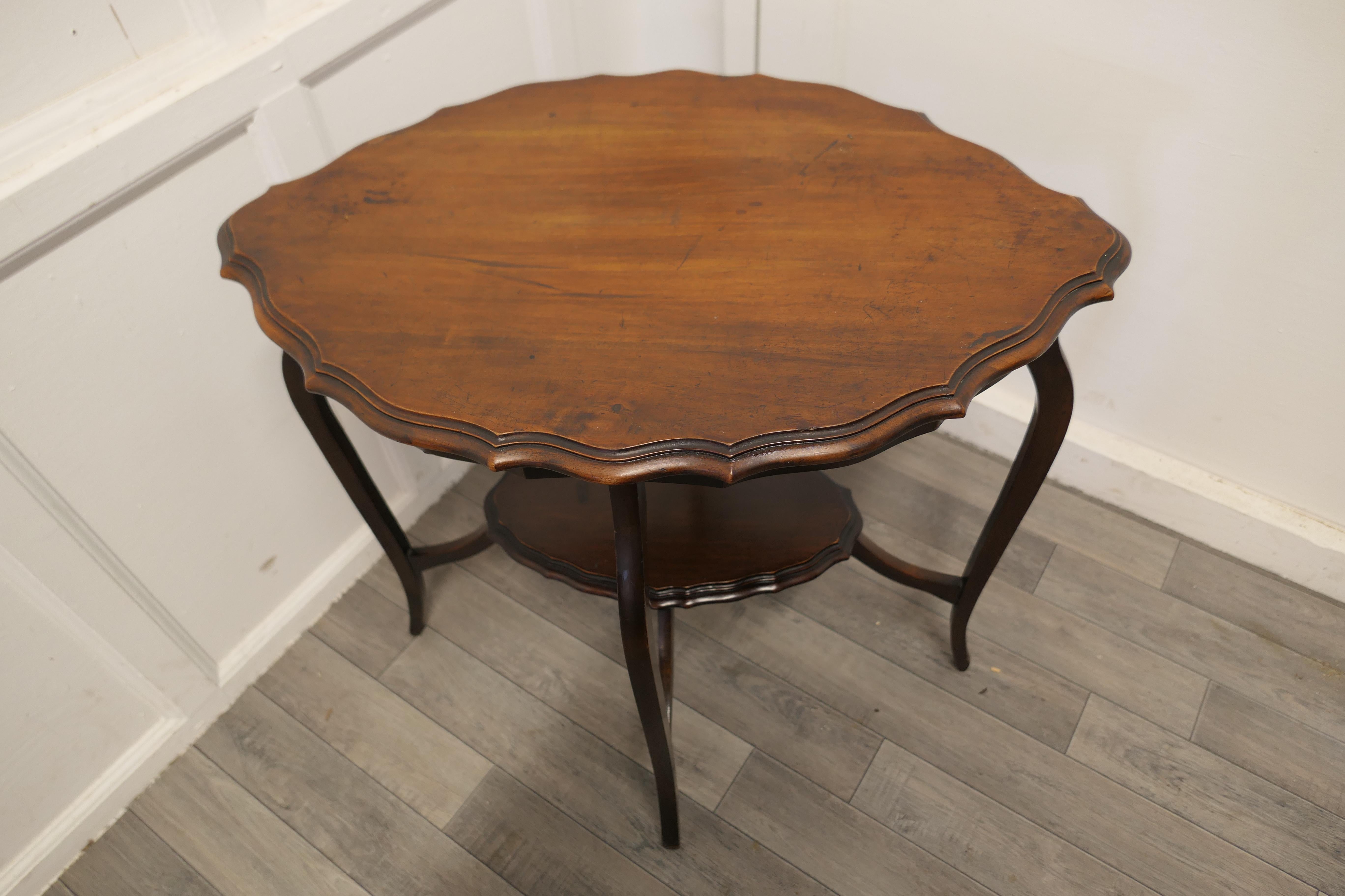 Oval Shaped Walnut Occasional Table, with Undertier For Sale 1