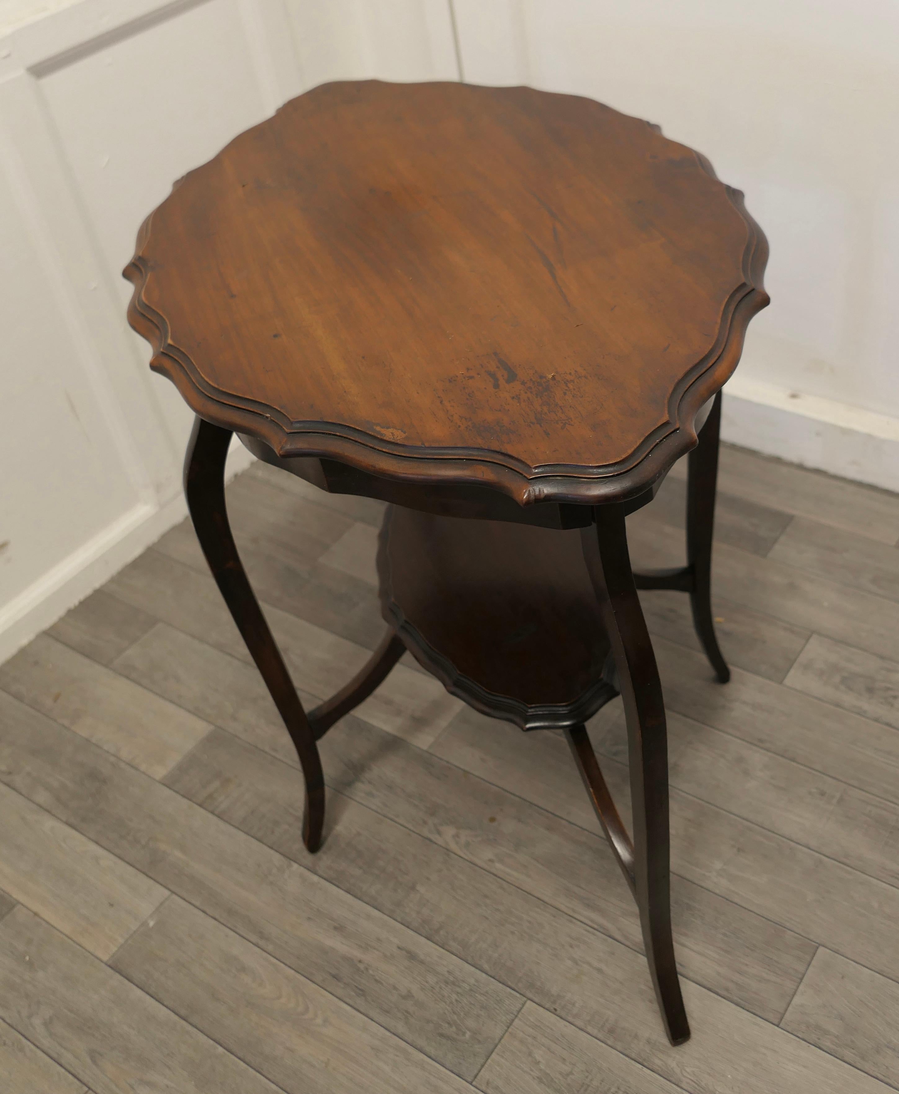 Oval Shaped Walnut Occasional Table, with Undertier For Sale 2