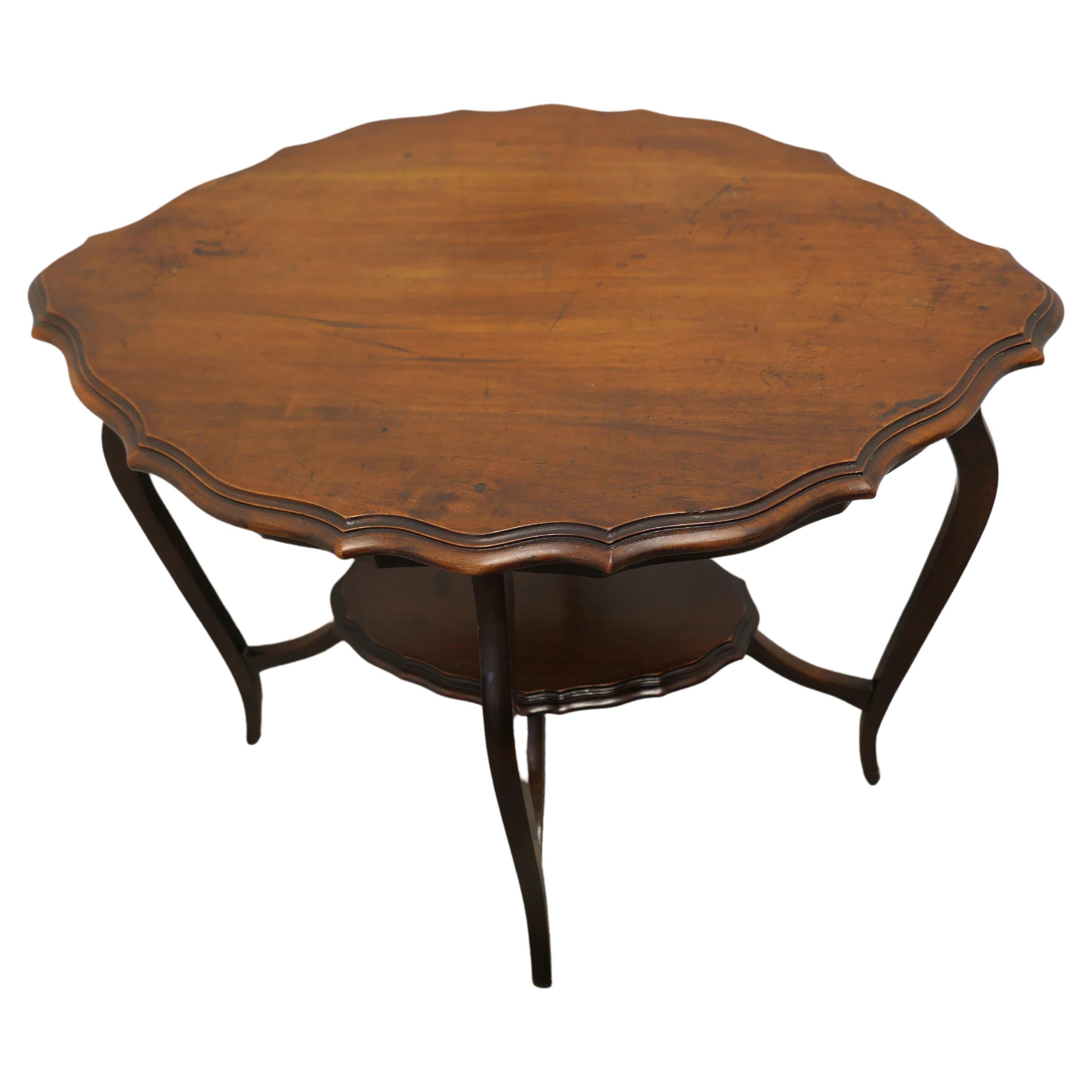 Oval Shaped Walnut Occasional Table, with Undertier For Sale