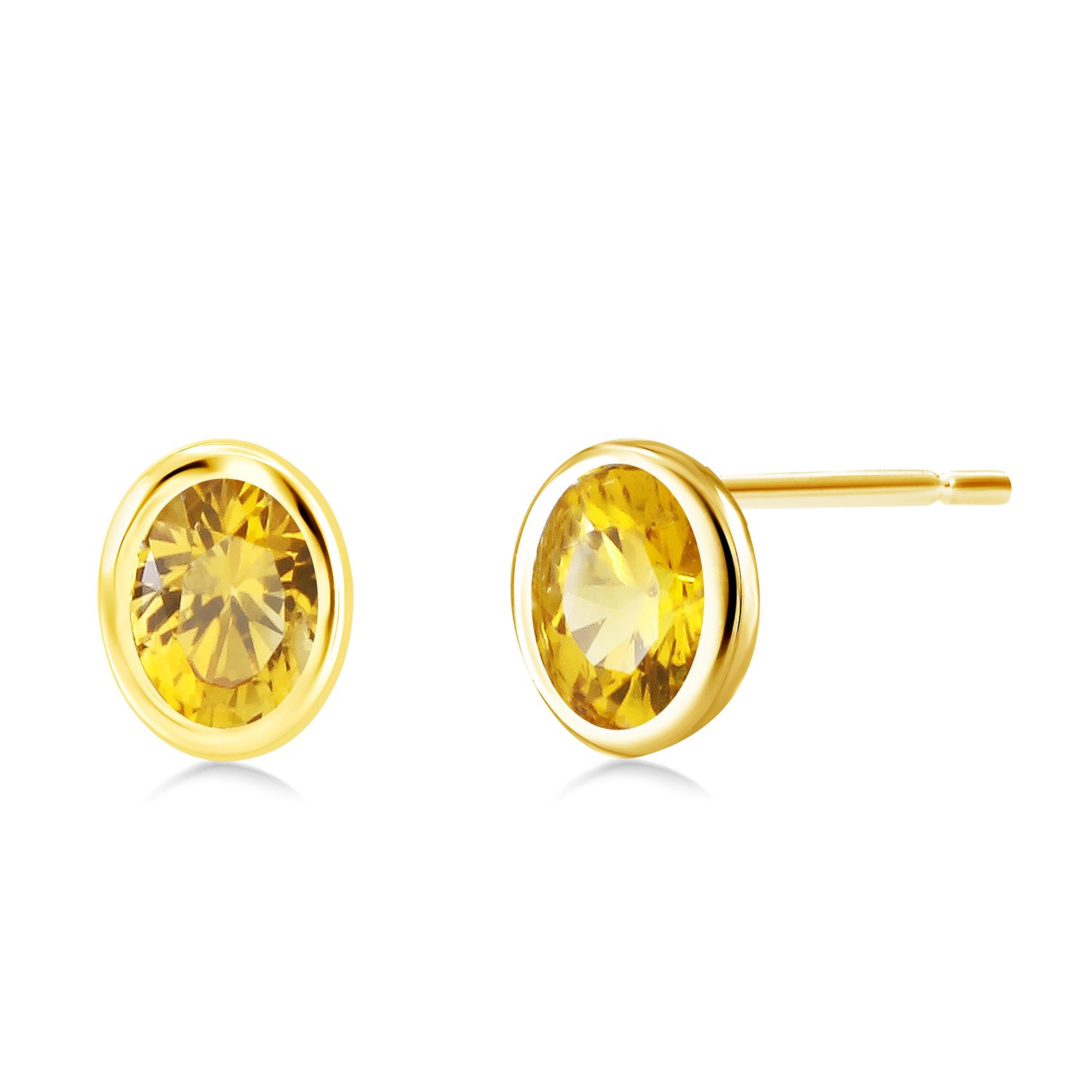 Oval Cut Yellow Sapphire 1.95 Carat Bezel Set 14 Karat Yellow Gold 0.35 Inch Earrings For Sale