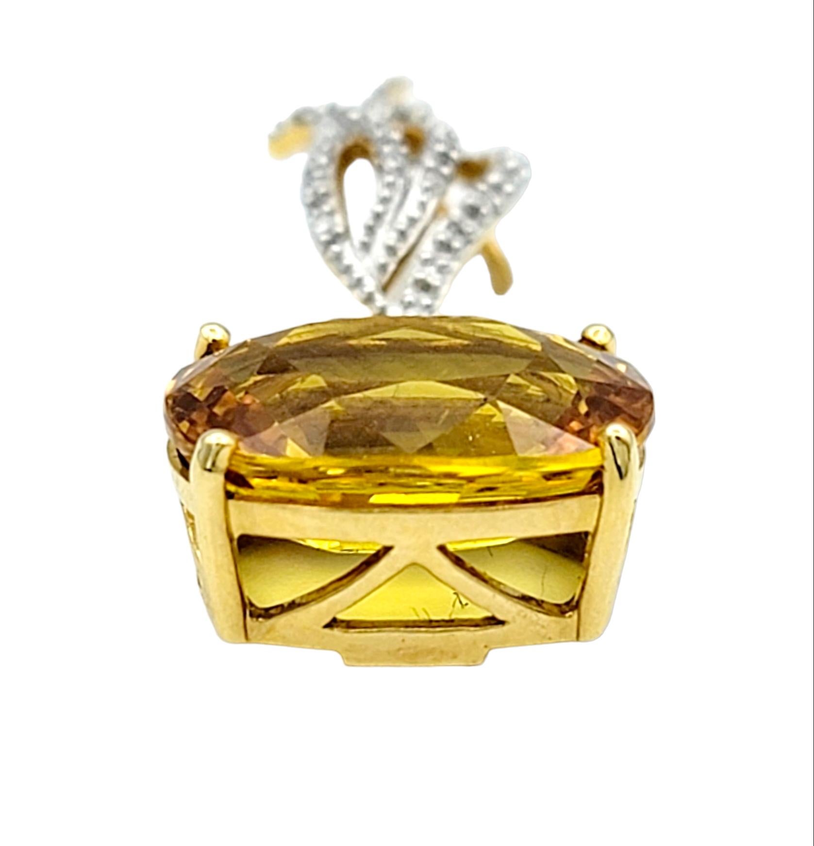 Women's Oval Shaped Yellow Sapphire & Round Diamond Pendant Set in 18 Karat Yellow Gold For Sale