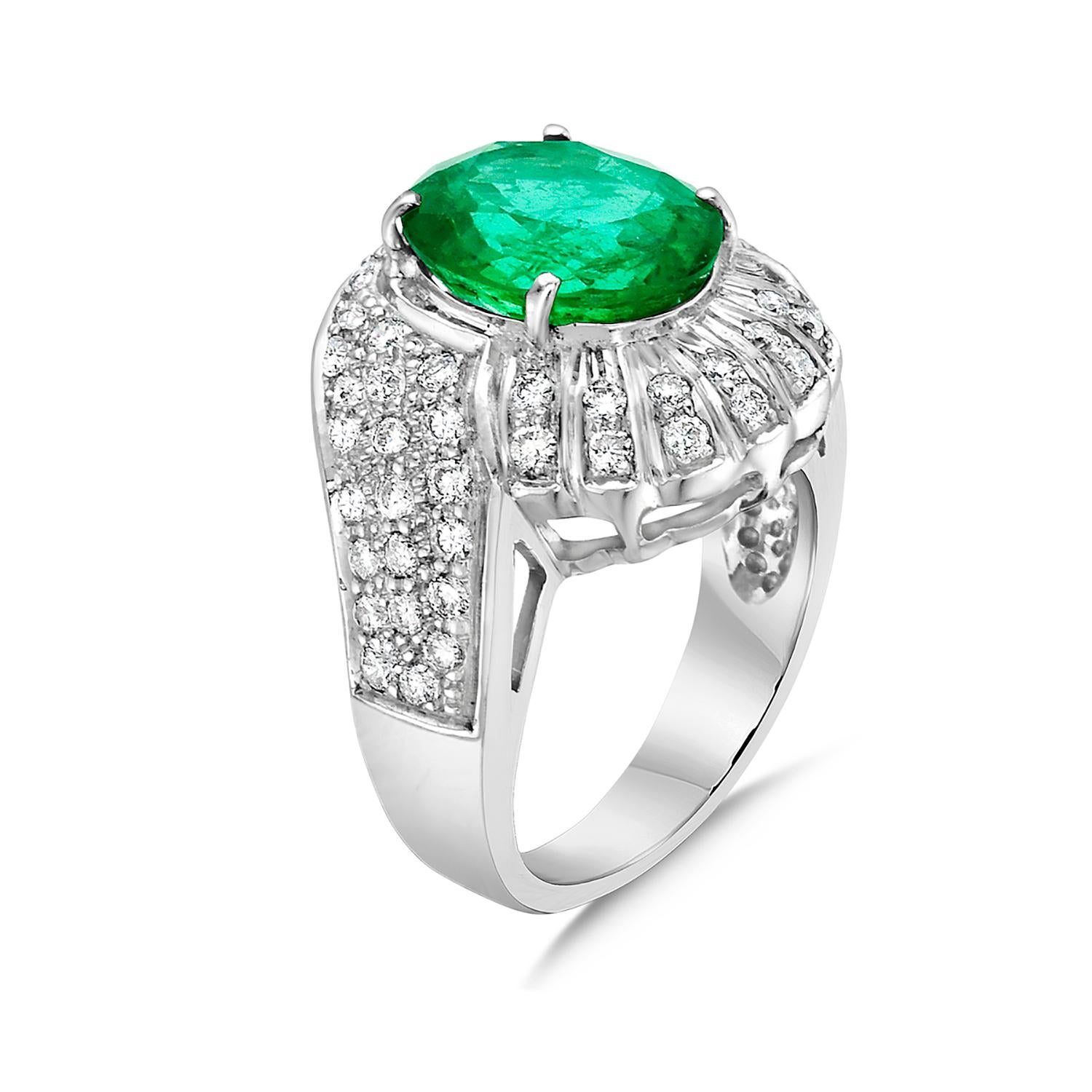 Contemporary Oval Shaped Zambian Emerald Cocktail Ring with Pave VS Diamond In 18k White Gold For Sale