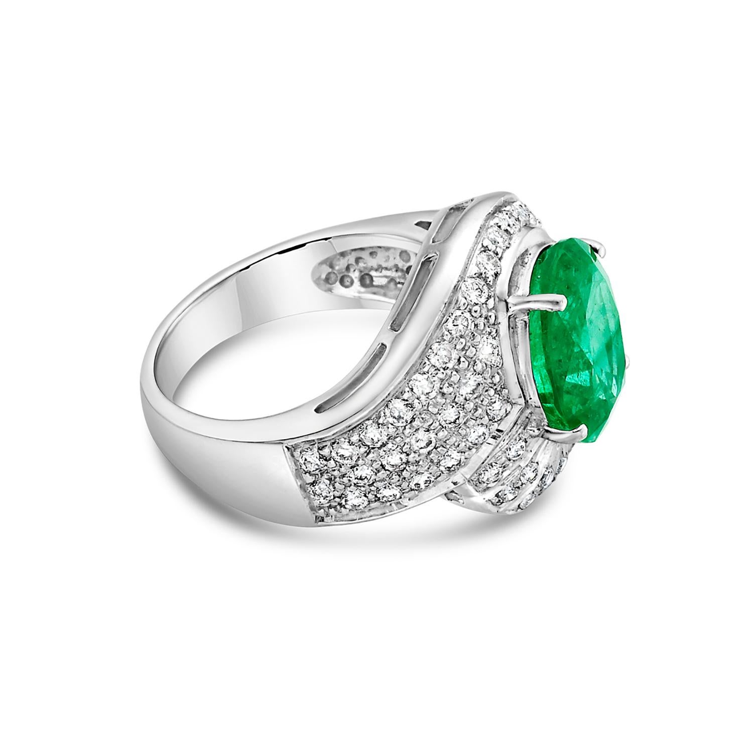Mixed Cut Oval Shaped Zambian Emerald Cocktail Ring with Pave VS Diamond In 18k White Gold For Sale