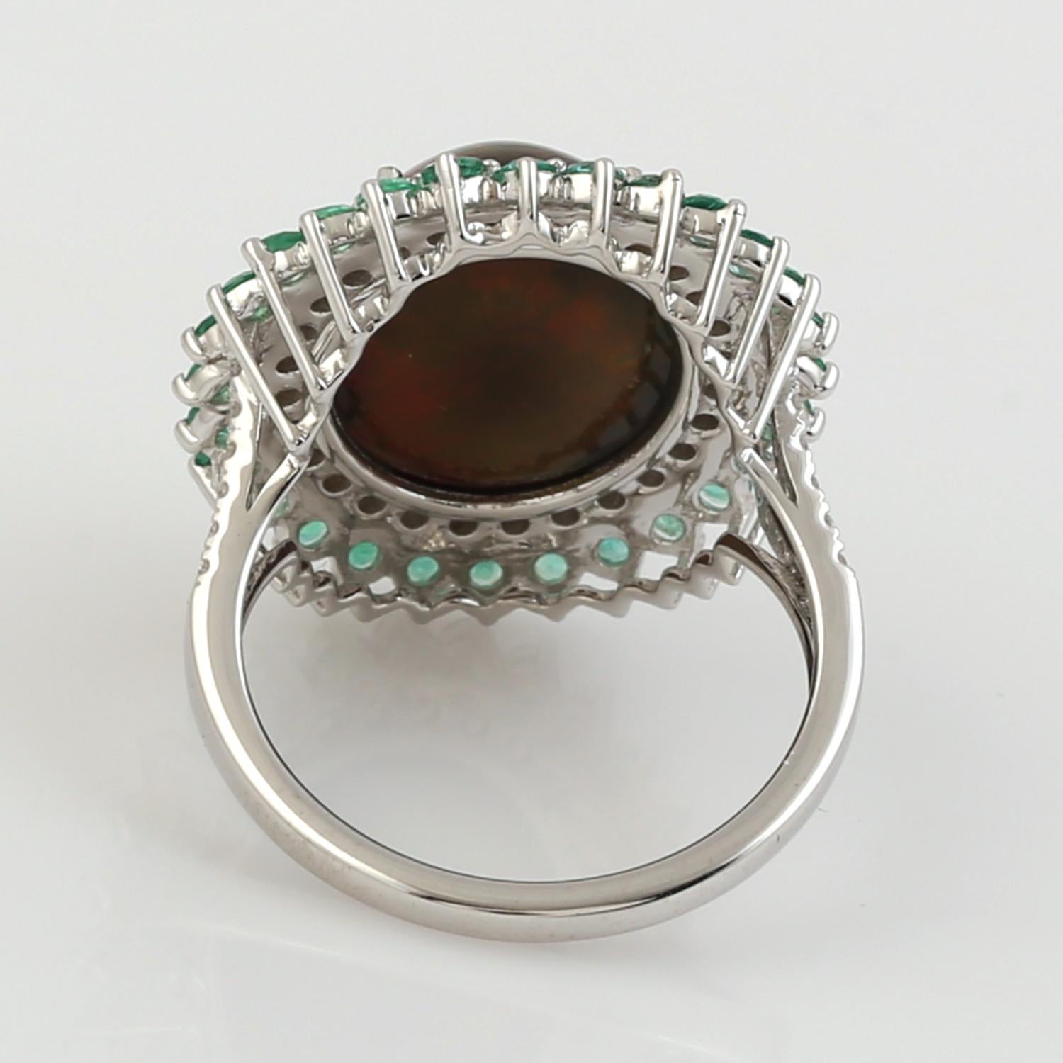 Contemporary Oval Shped Opal Ring With Emerald & Pave Diamonds Made In 18K White Gold For Sale