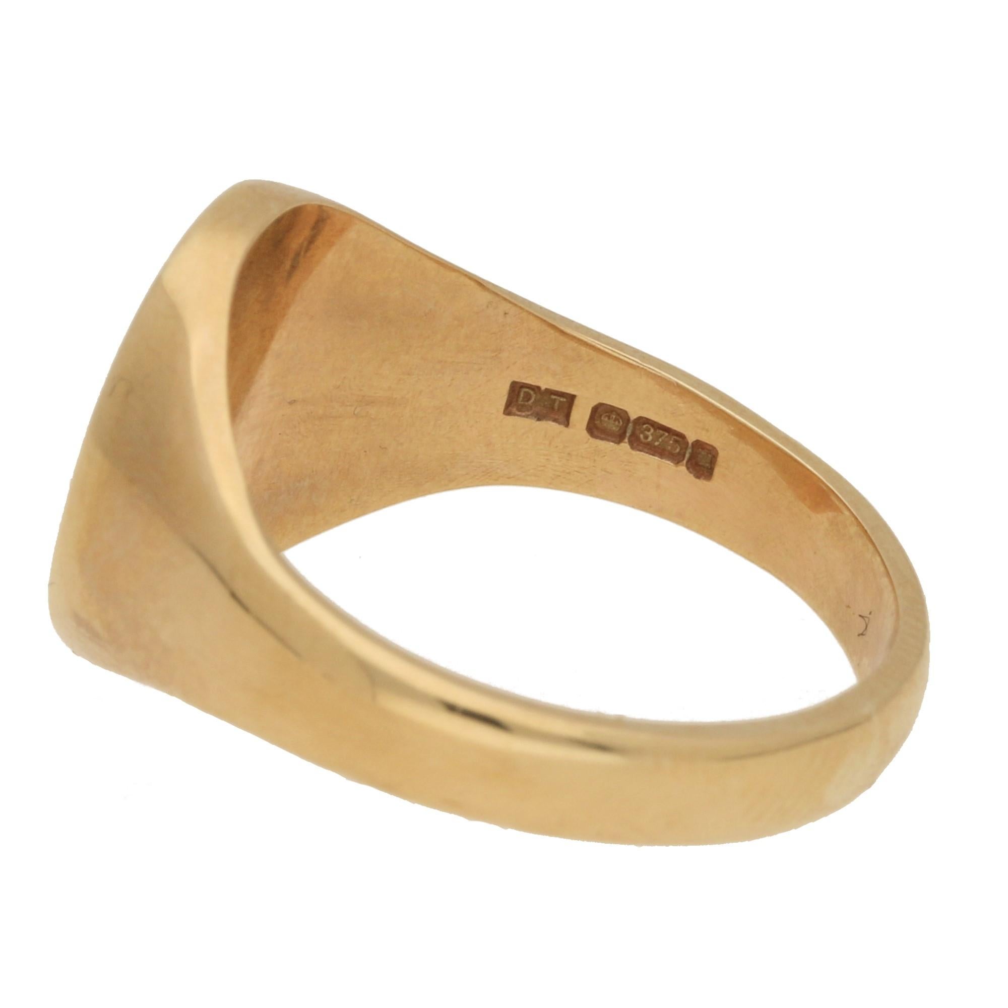 A classic oval signet ring made of solid 9k yellow gold. 

The ring head measures approximately 12 x 10mm and is left bare so that the wearer has the option to customise it in the future. Typically signets are decorated with a family crest or
