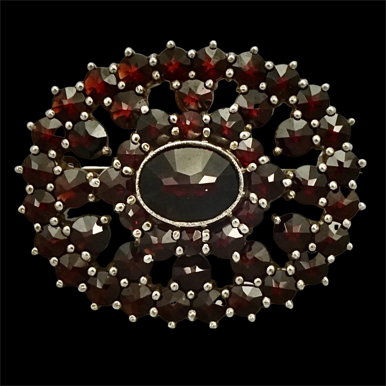 Women's or Men's Oval Silver and Garnet Brooch circa 1930s For Sale