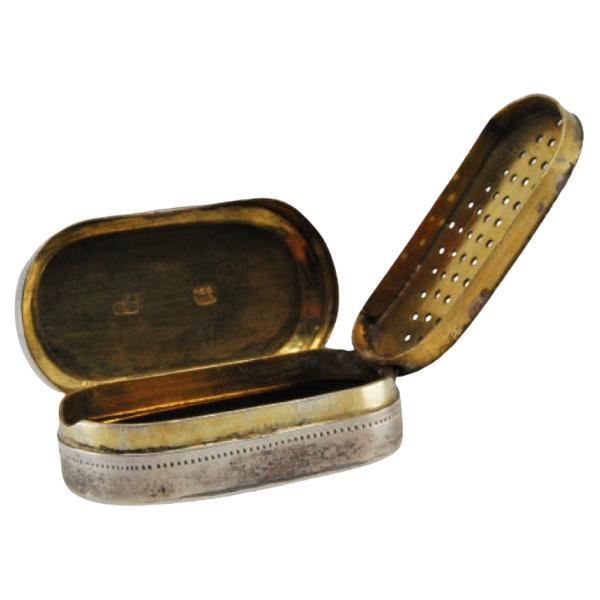 Oval silver-gold vinaigrette with engraved lid, George III period