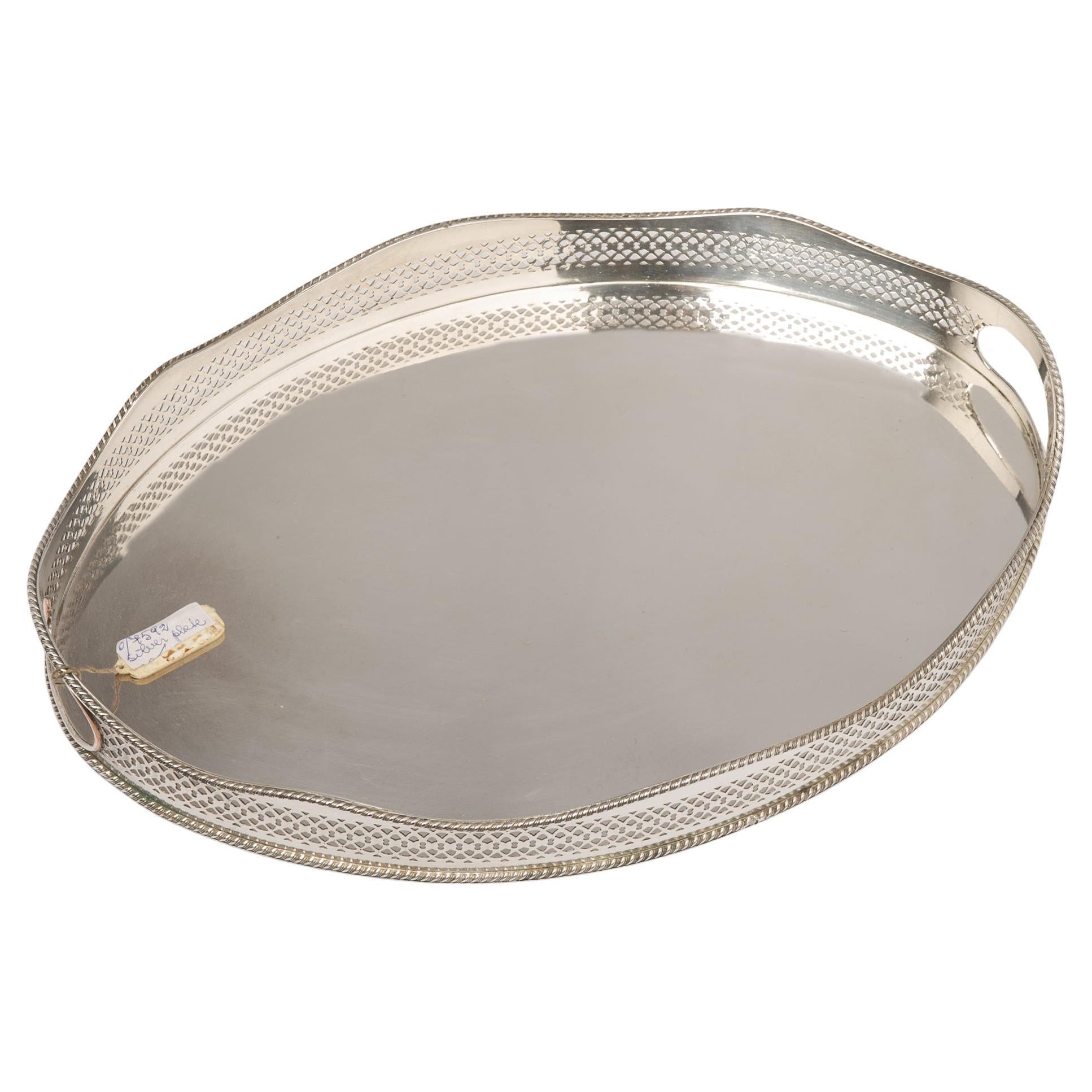 Oval little footed silver plated gallery tray: a perfect serving tray, simply elegant.