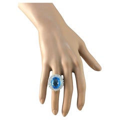 Oval Sky Blue Topaz Diamond Double Sun Ray Flower Halo 18 Karat White Gold Ring
