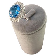 Oval Sky Blue Topaz Diamond Double Sun Ray Flower Halo 18 Karat White Gold Ring