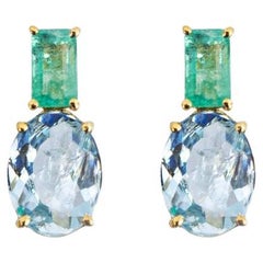 Oval Sky Topaz And Rectangular Emerald Stud Earrings / 18k Yellow Gold