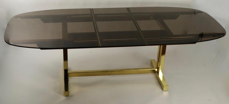 Post-Modern Oval Smoked Glass and Brass Dining Table For Sale