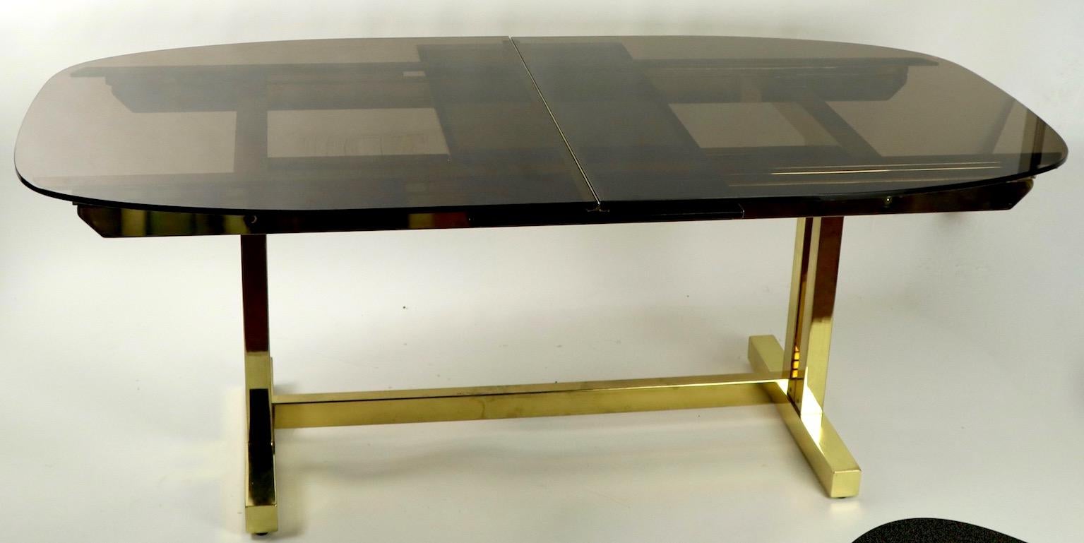 Oval Smoked Glass and Brass Dining Table In Good Condition For Sale In New York, NY