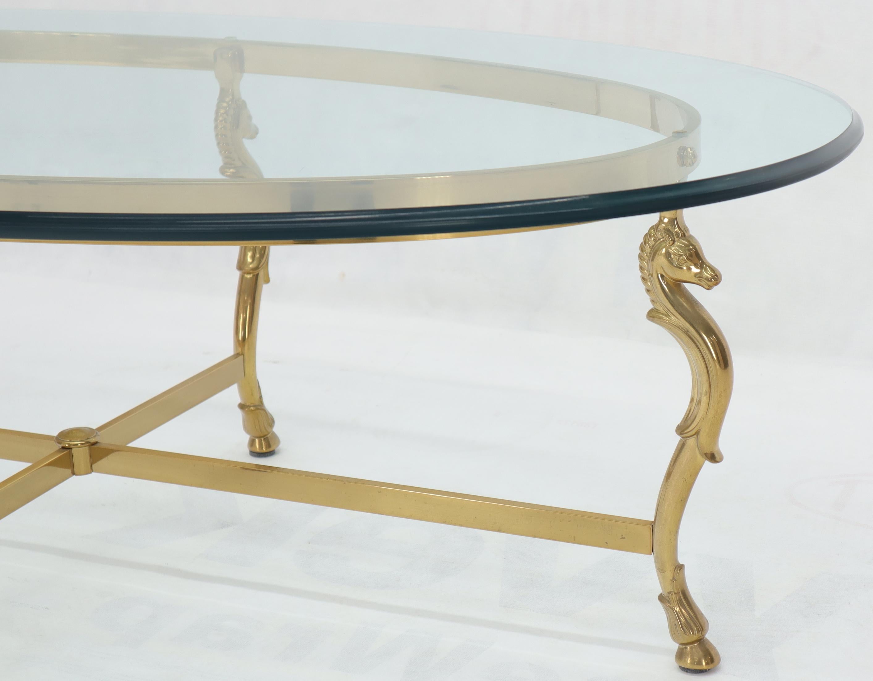 Mid-Century Modern Oval Solid Brass Hoof Feet Horse Heads Base Glass Top Coffee Table