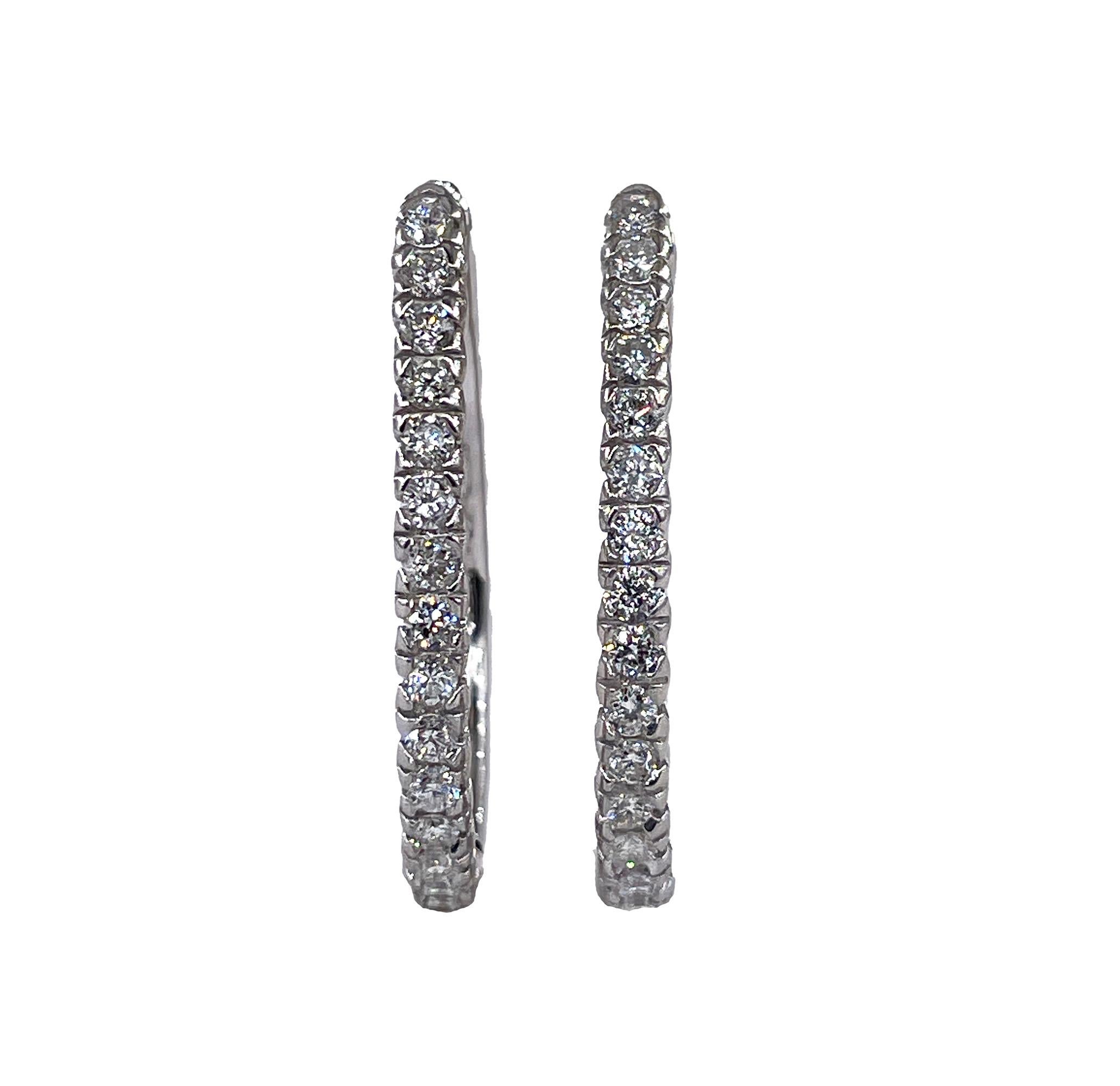 Sonia B. Bitton 0.90ctw Round Diamonds Hoop Earrings Oval 14k White Gold 

This great pair will make the perfect gift: 14k white gold Sonia B. 0.90ctw elongated oval hoop earrings with bright and sparkly round brilliant diamonds. Sonia B Designs is