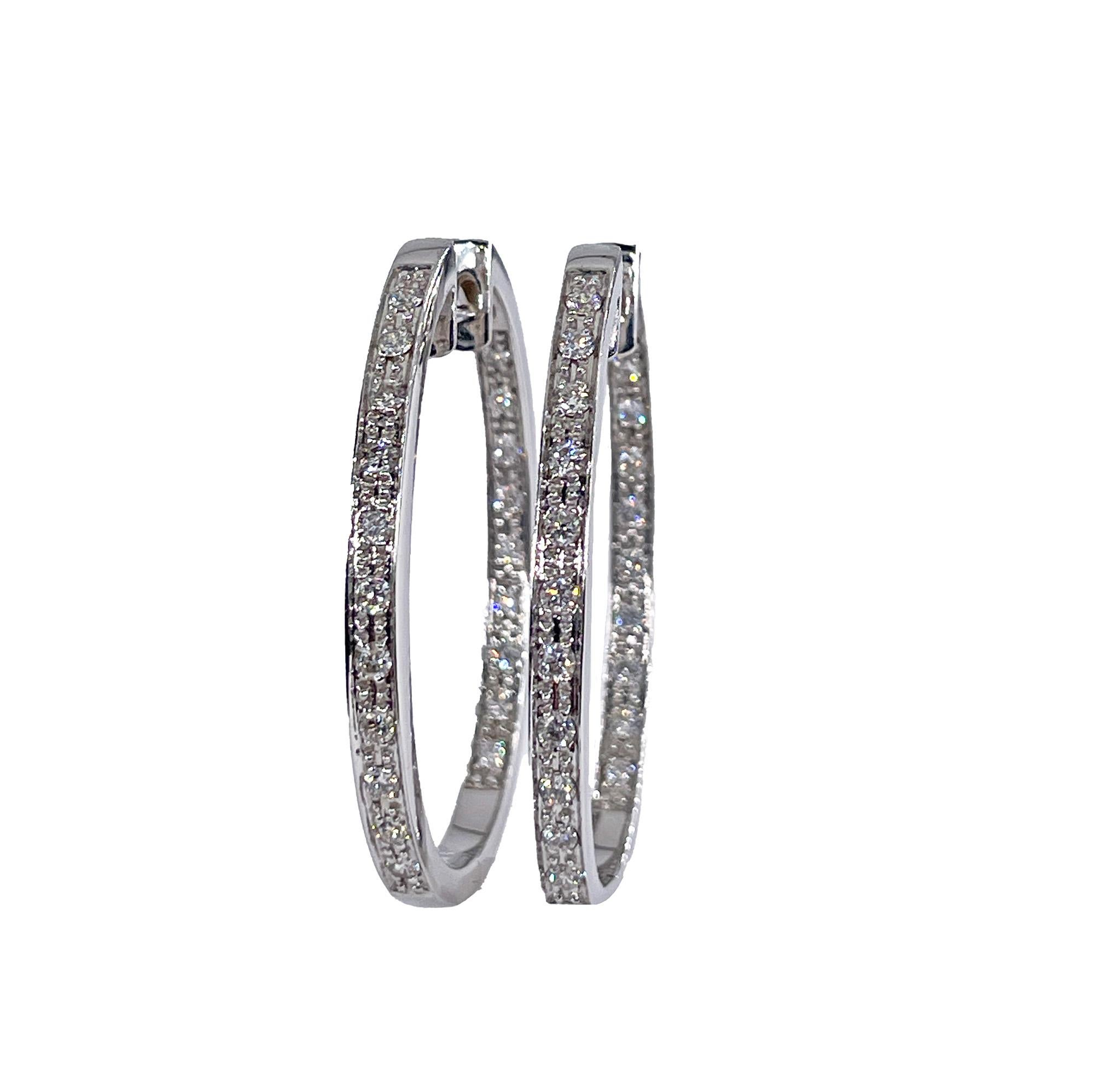 Sonia B. Bitton 1.1ctw Diamond Hoop Earrings Inside Out Oval 14k White Gold 

This great pair will make the perfect gift: 14k white gold Sonia B. 1.1ctw elongated oval inside-out diamond hoop earrings. Sonia B Designs is a luxury fine jewelry