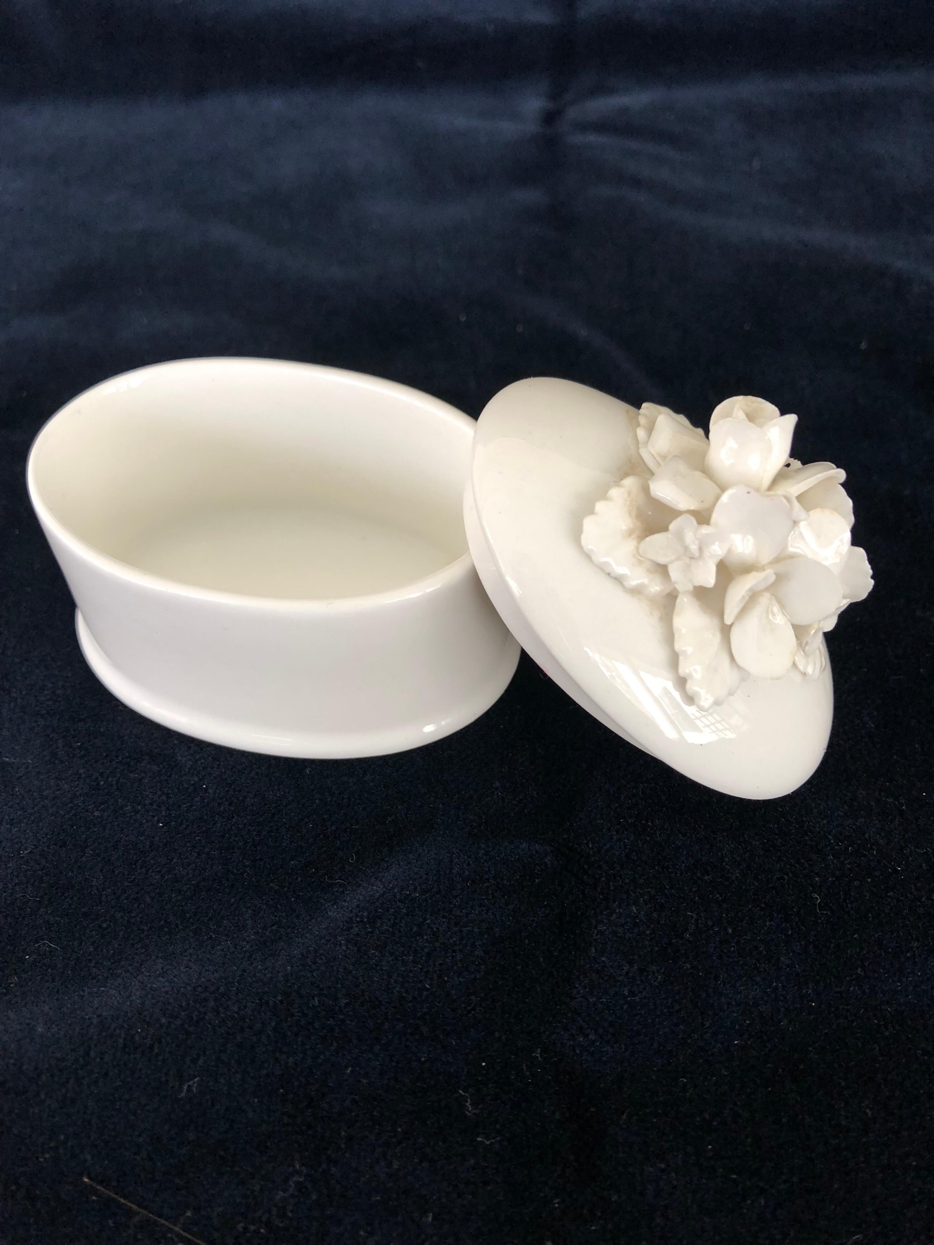 Staffordshire oval bone China pin box with raised porcelain flowers and leaves decorating the lid. Purchased 1960s Tiffany & Co.