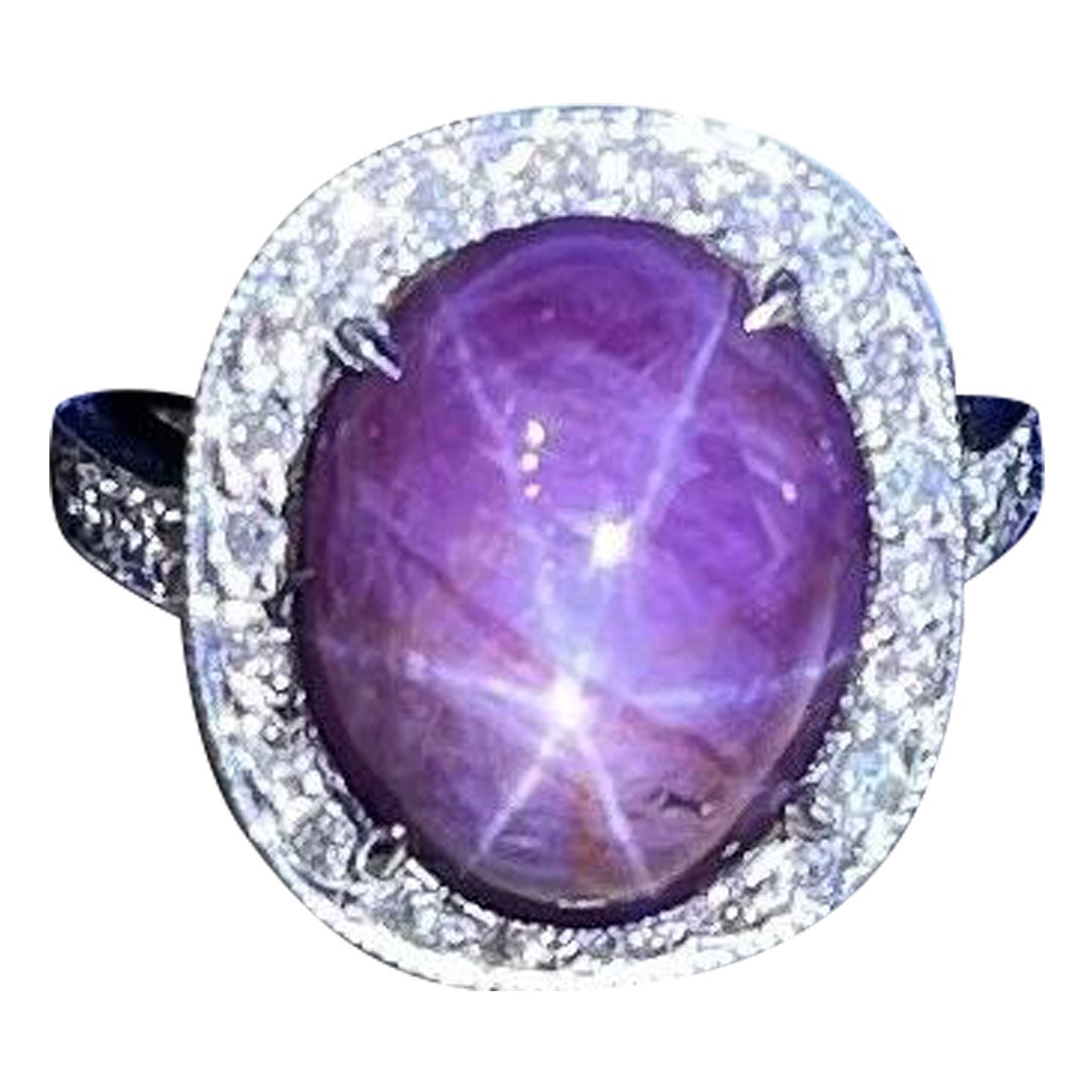 Oval Star Ruby 17.83 carat and Diamond Halo Ring in 18k White Gold