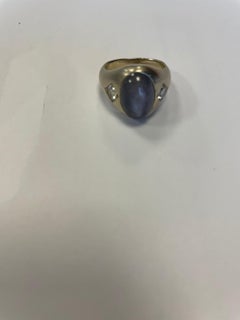 Oval Star Sapphire and Two Round Diamond White Set in White Gold Ring