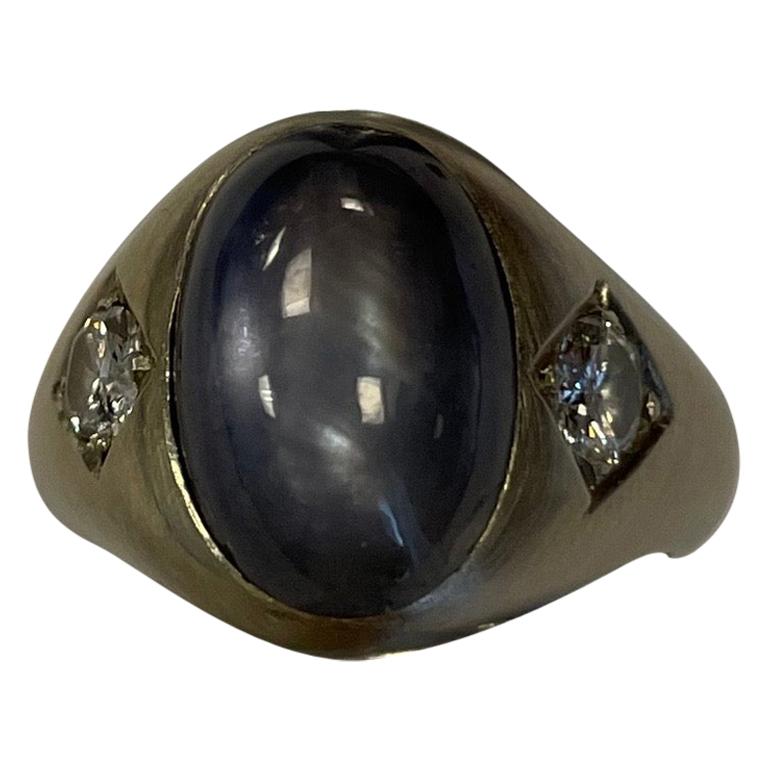 Oval Star Sapphire and Two Round Diamond White Set in White Gold Ring