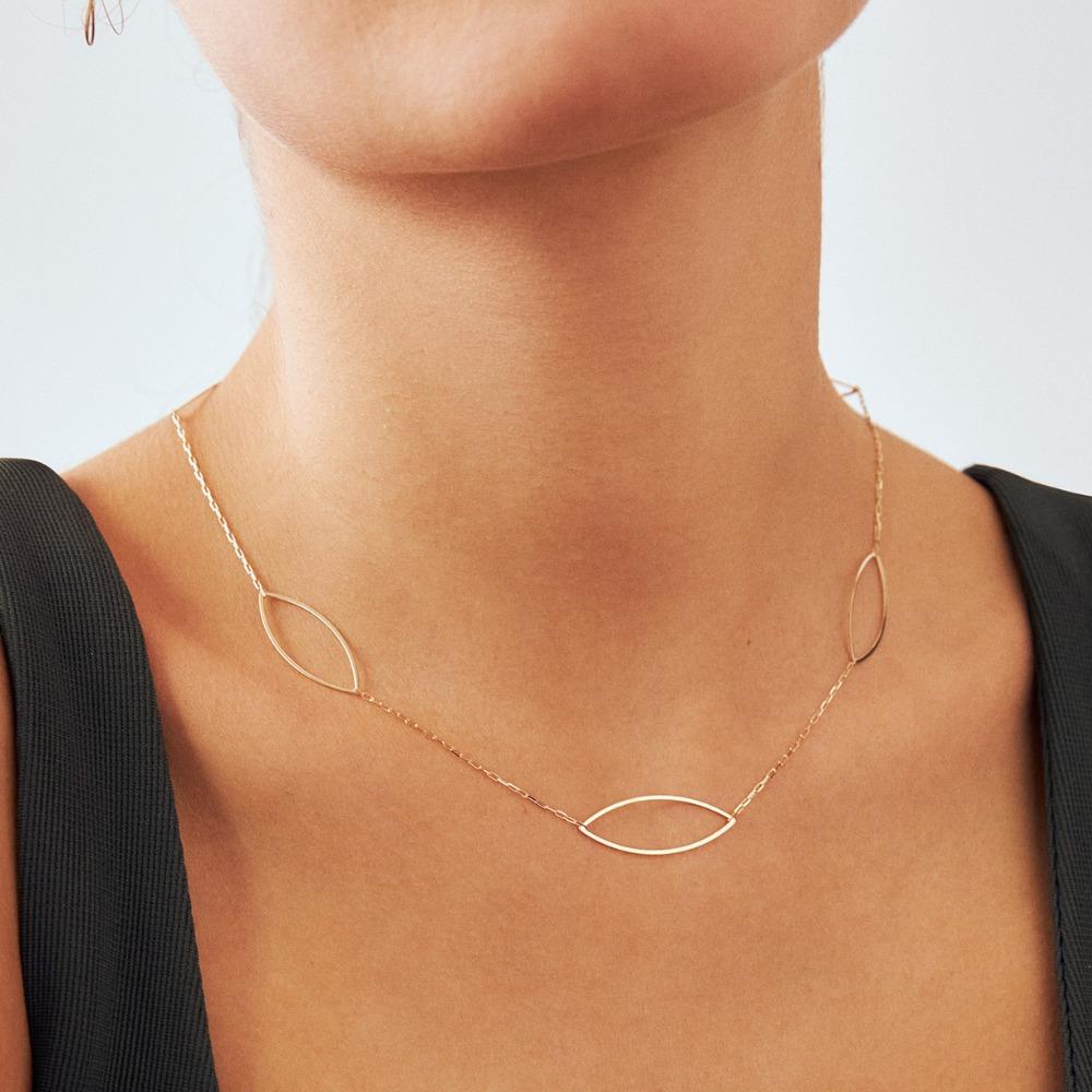 Introducing the 14K Solid Gold Oval Station Necklace, a true representation of Orena Jewelry's steadfast commitment to supreme artisanship. Each intricate detail of this necklace is laboriously handcrafted, effusing an essence of luxury entwined