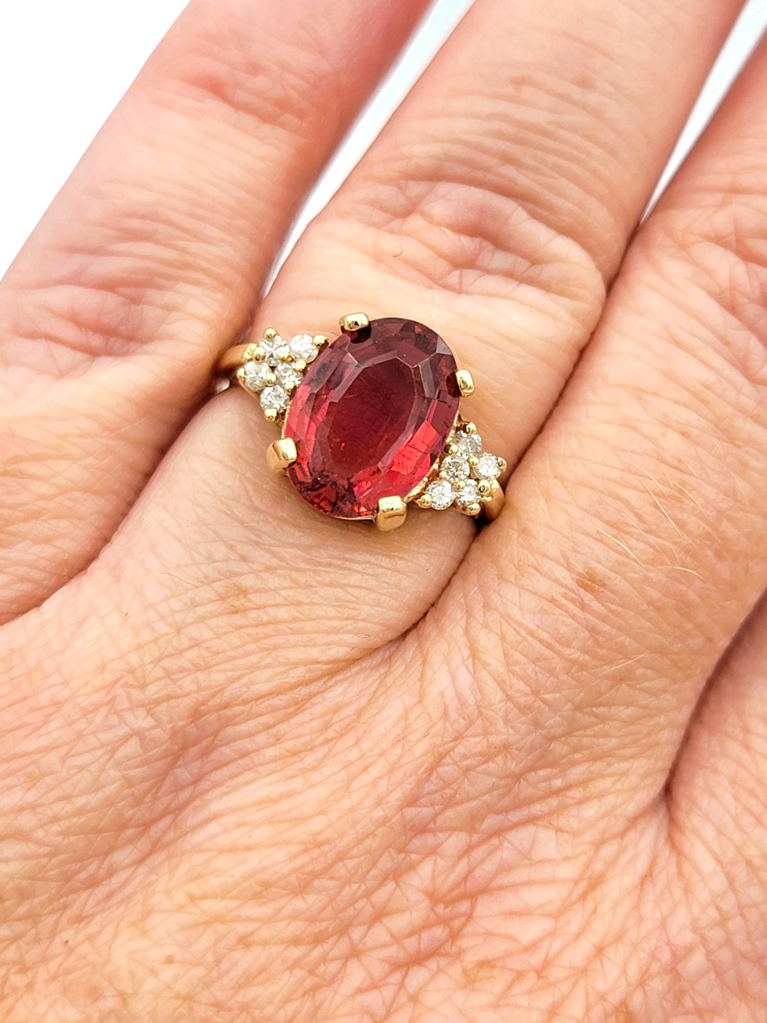 Oval Step Cut Pink Tourmaline and Cluster Diamond Ring in 14 Karat Yellow Gold For Sale 4