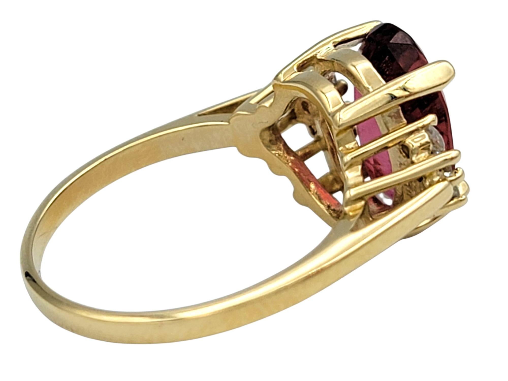 Oval Step Cut Pink Tourmaline and Cluster Diamond Ring in 14 Karat Yellow Gold For Sale 1