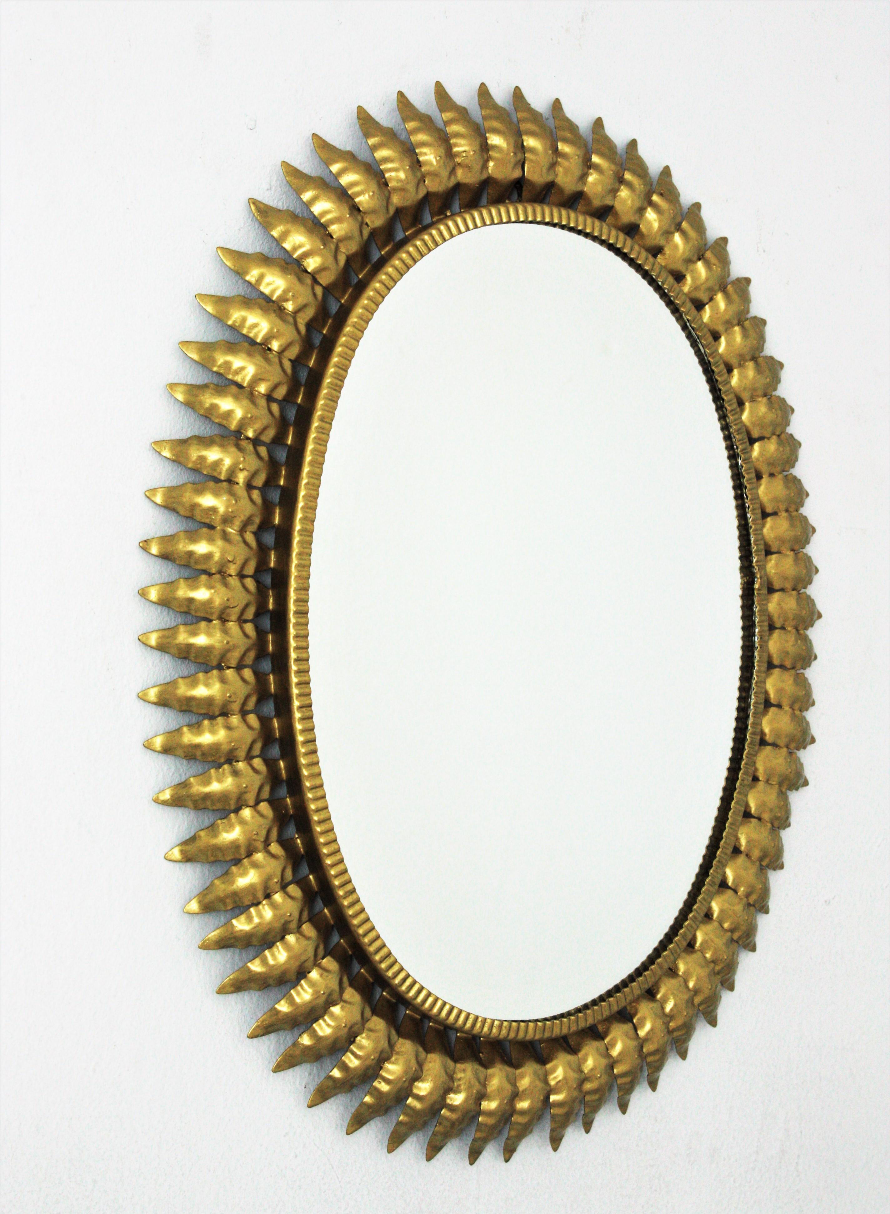 1960s Spanish Sunburst Oval Mirror, Gilt Iron For Sale 4