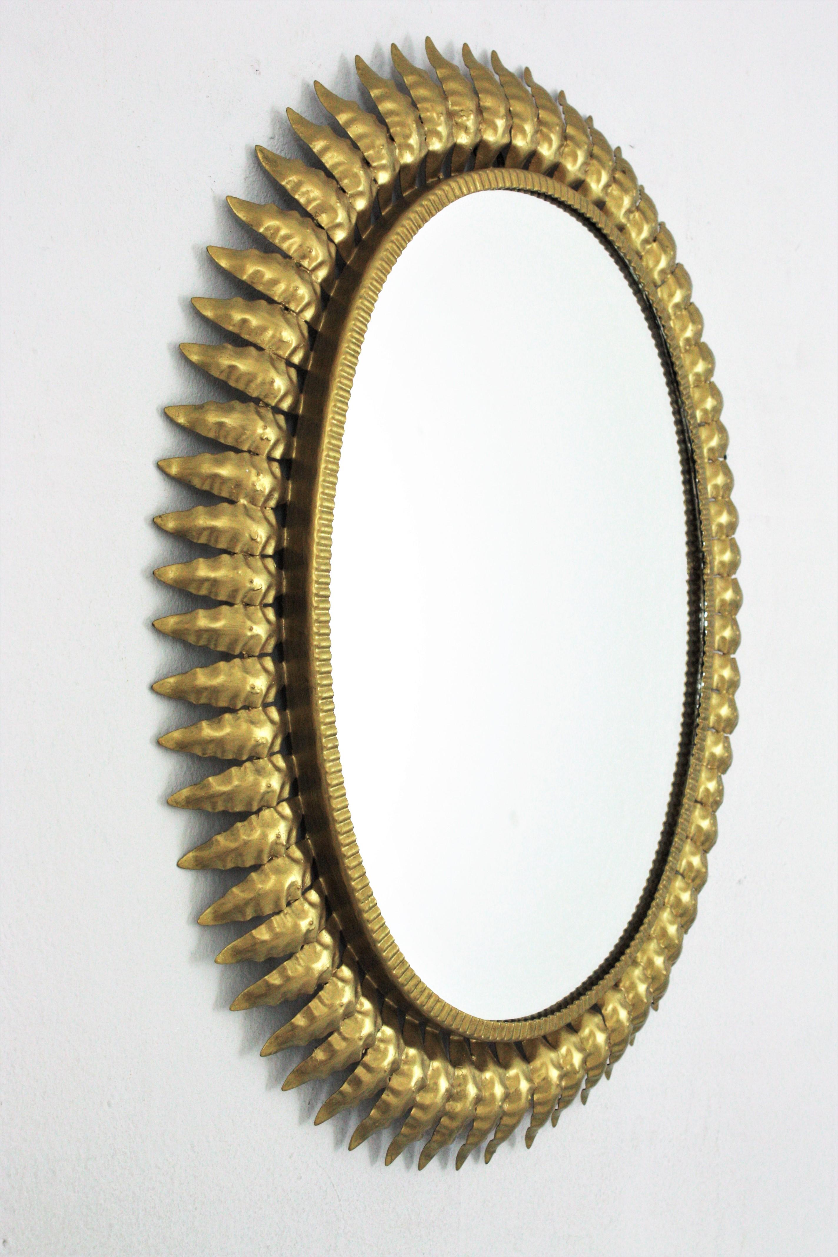 1960s Spanish Sunburst Oval Mirror, Gilt Iron In Good Condition For Sale In Barcelona, ES