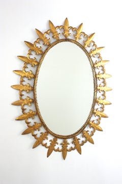 Oval Sunburst Mirror in Gilt Iron, Fleur de Lys Frame, Spain 1950s