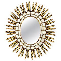 Ovaler Sunburst-Spiegel aus Giltwood mit Spiegeleinsätzen, spanischer Kolonialstil, 1950er Jahre