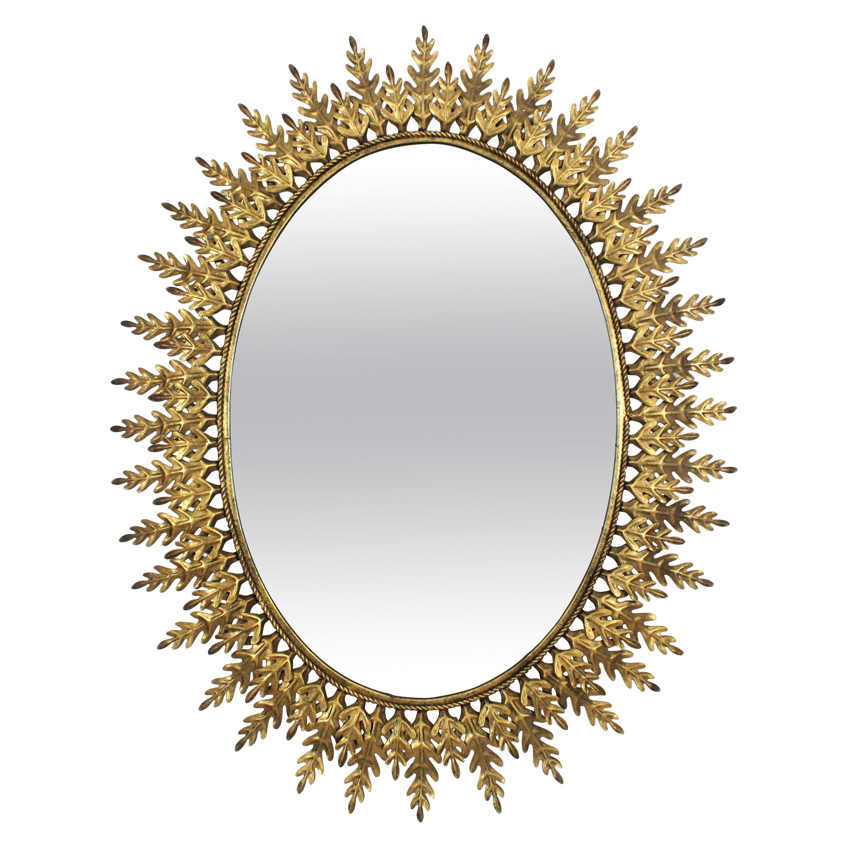 Miroir ovale Sunburst avec cadre feuillagé, métal doré, années 1960
