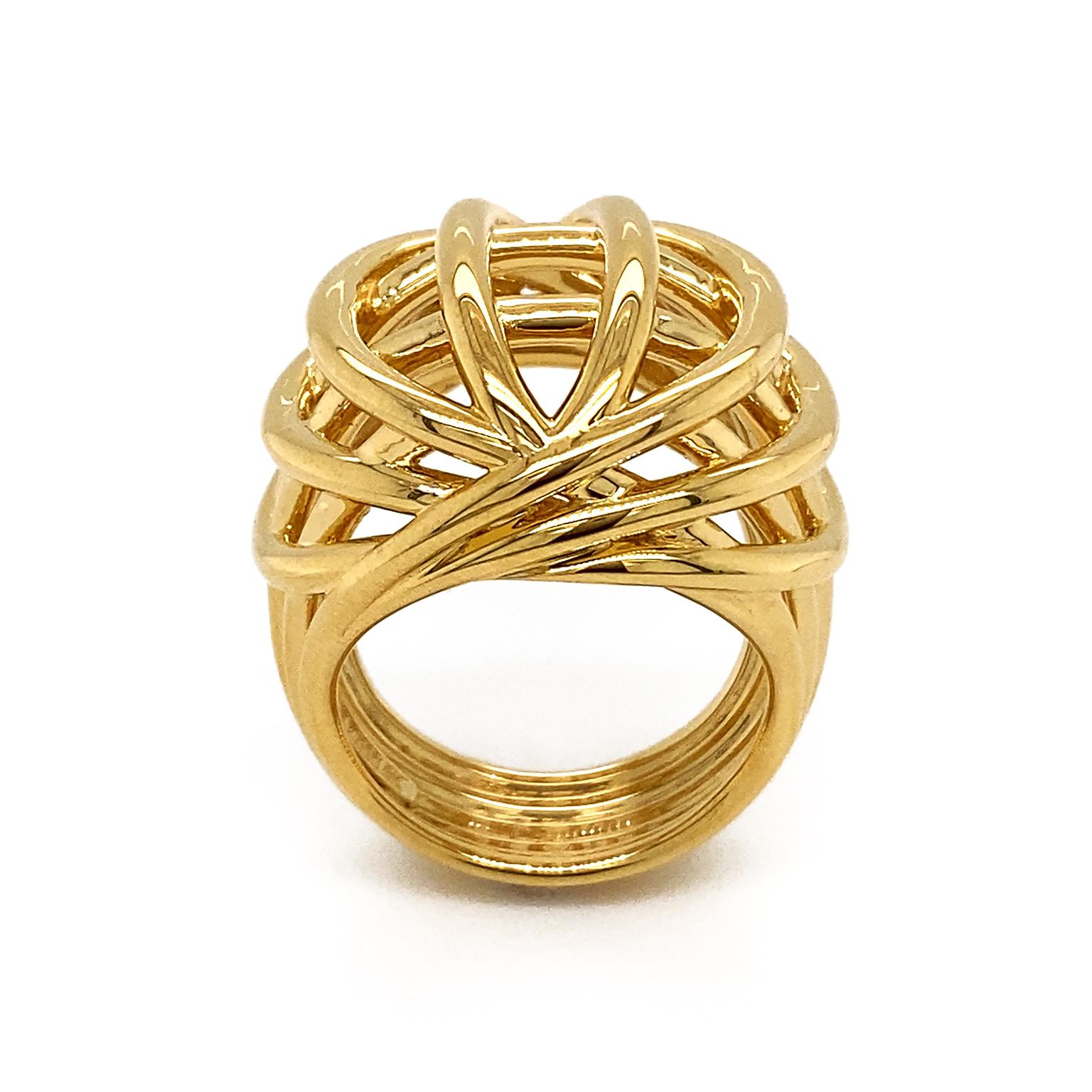 Intricacy with the vivid metal of 18k yellow gold creates a memorable motif. A multi-split band ascends on both sides and intertwines throughout. The finished result is a voluminous openwork design.