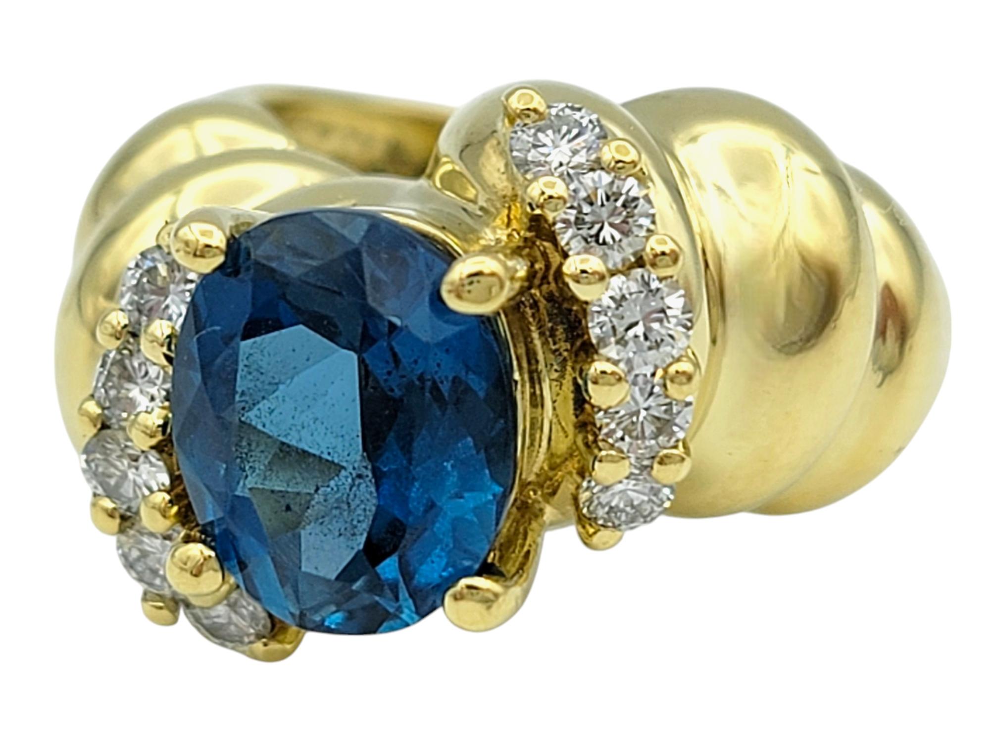 Contemporary Oval Swiss Blue Topaz and Diamond Chunky Ridged Band Ring 18 Karat Yellow Gold For Sale