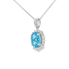Oval Swiss Blue Topaz and Diamond Pendant in 14K White Gold, 18 Inch