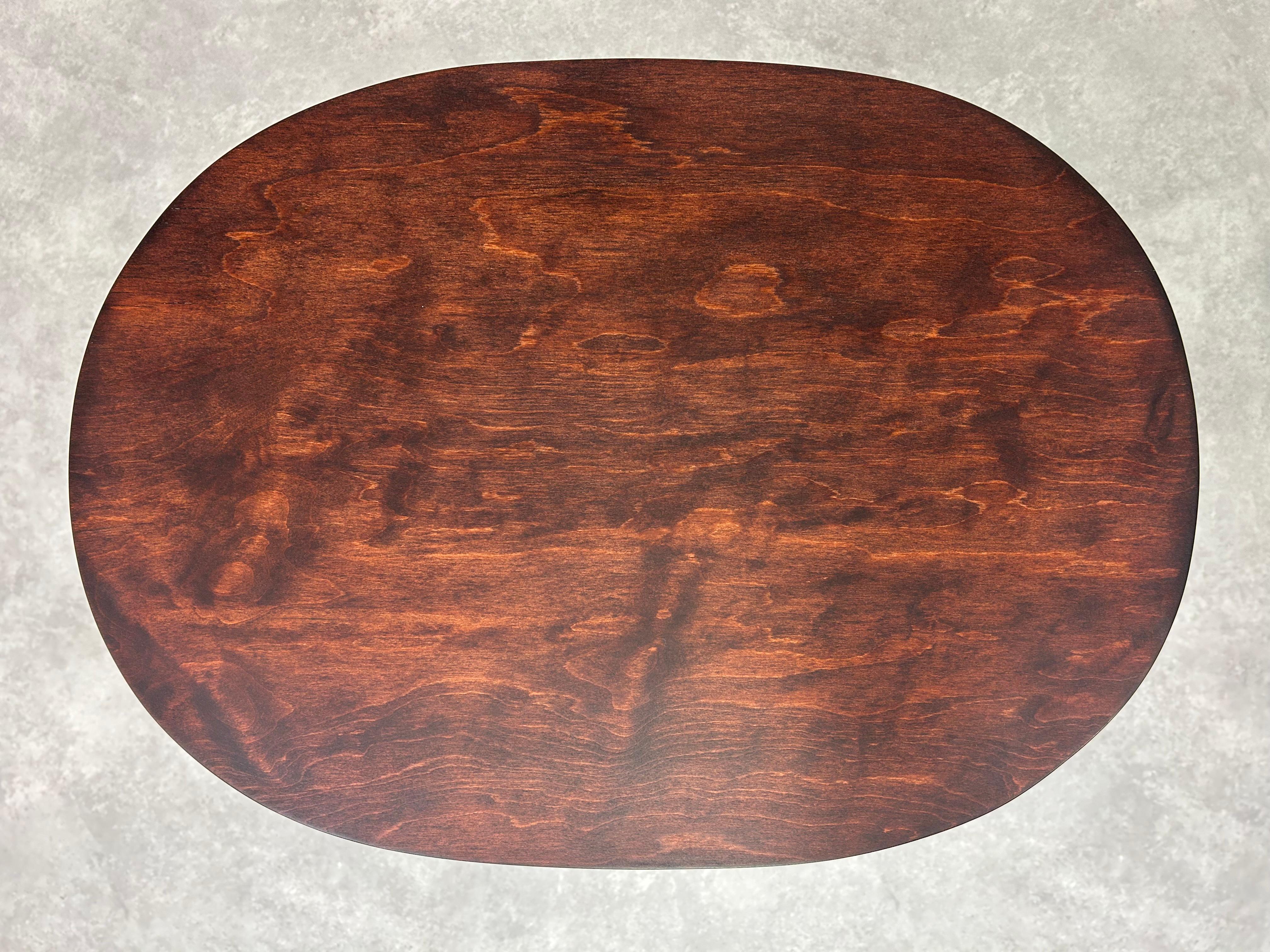 Oval table by arch. Marcel Kammerer for Thonet. Professionally stained and repolished.