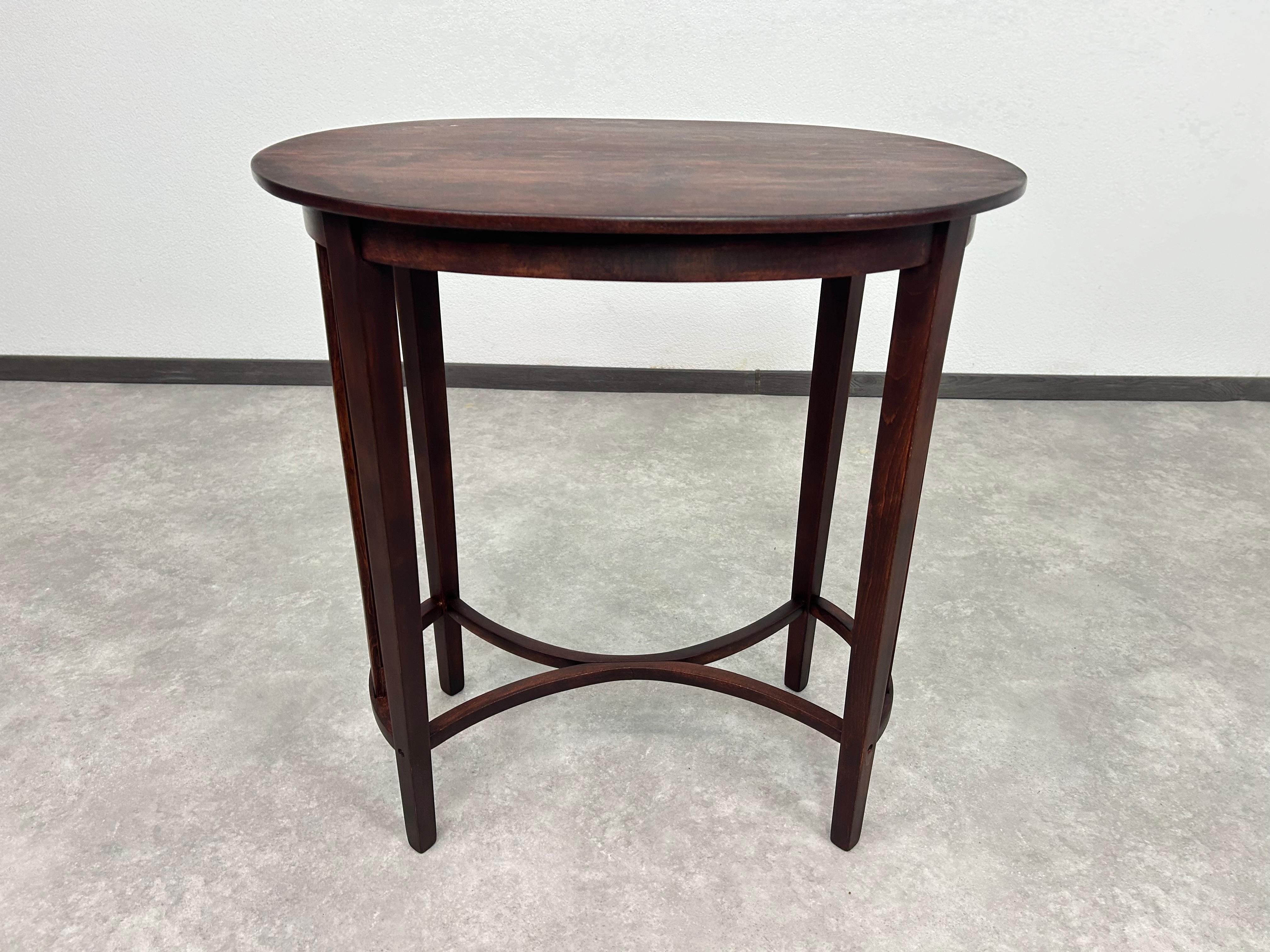 Austrian Oval table by arch. Marcel Kammerer for Thonet For Sale
