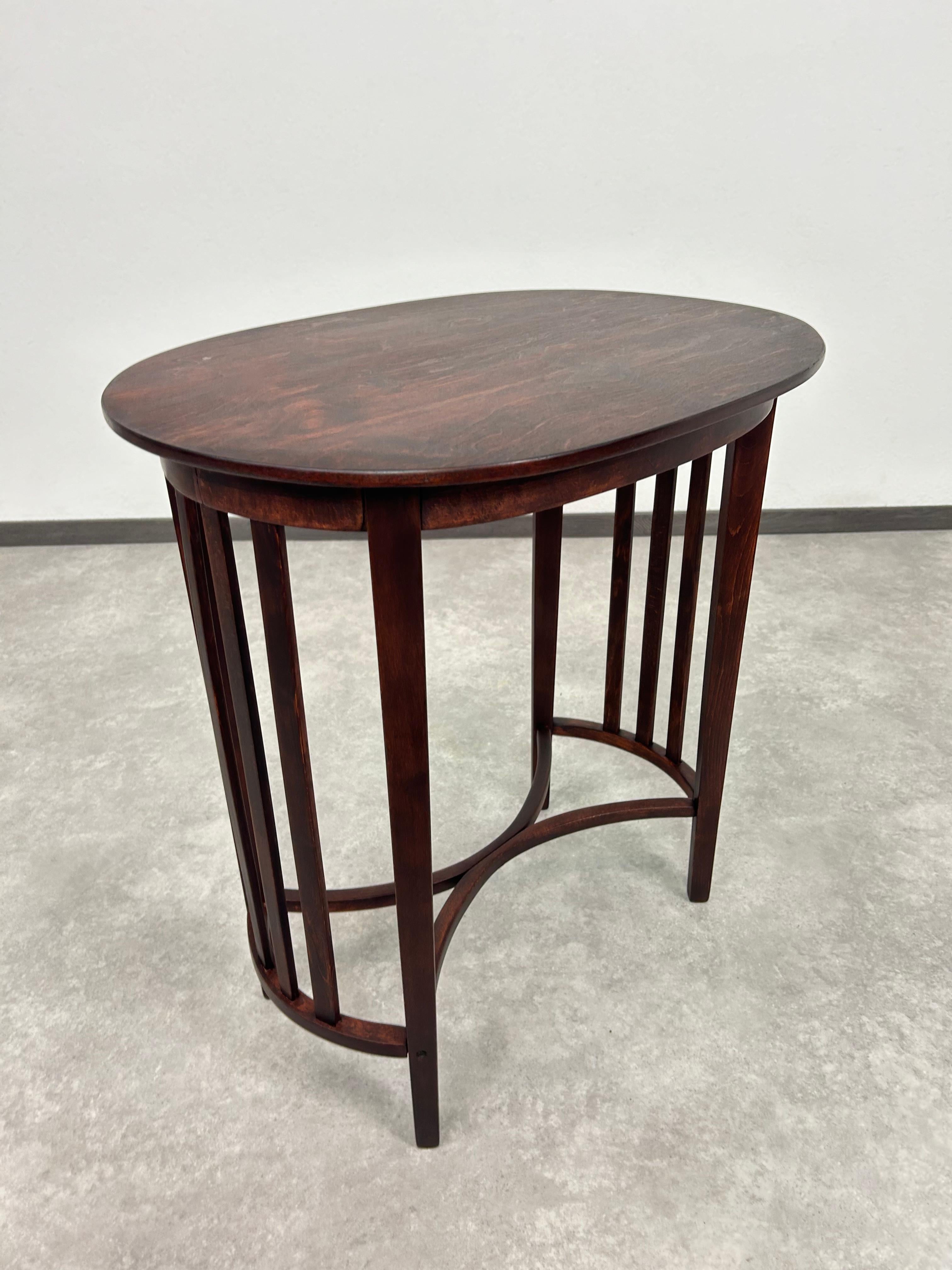 Beech Oval table by arch. Marcel Kammerer for Thonet For Sale